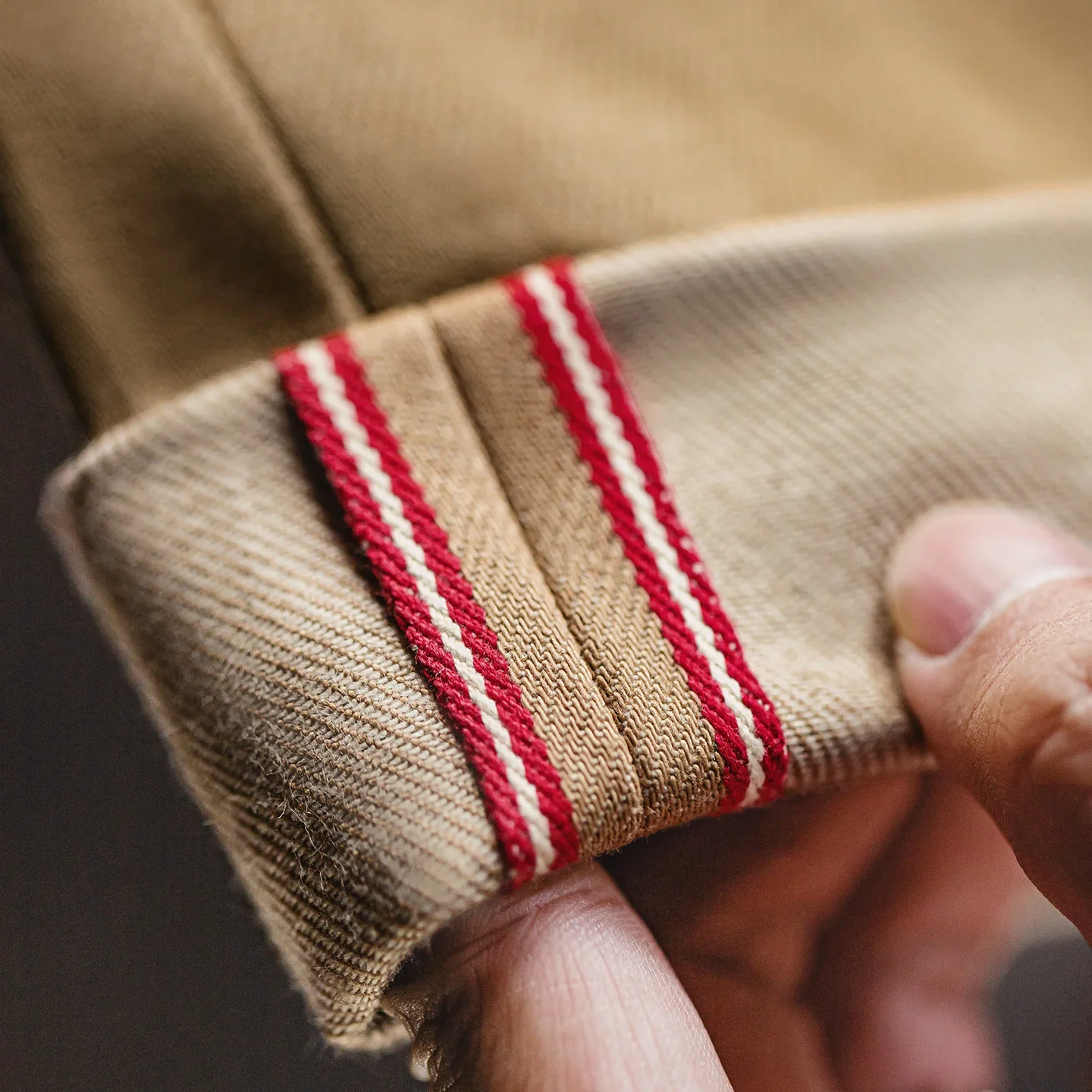 Selvedge cuff detail with red and white edge tape
